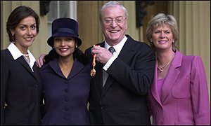 Michael Caine with his wife Shakira and daughter Natasha, left, and Dominique, a daughter from a previous marriage