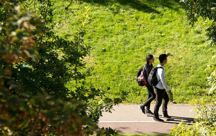 Students walking across campus