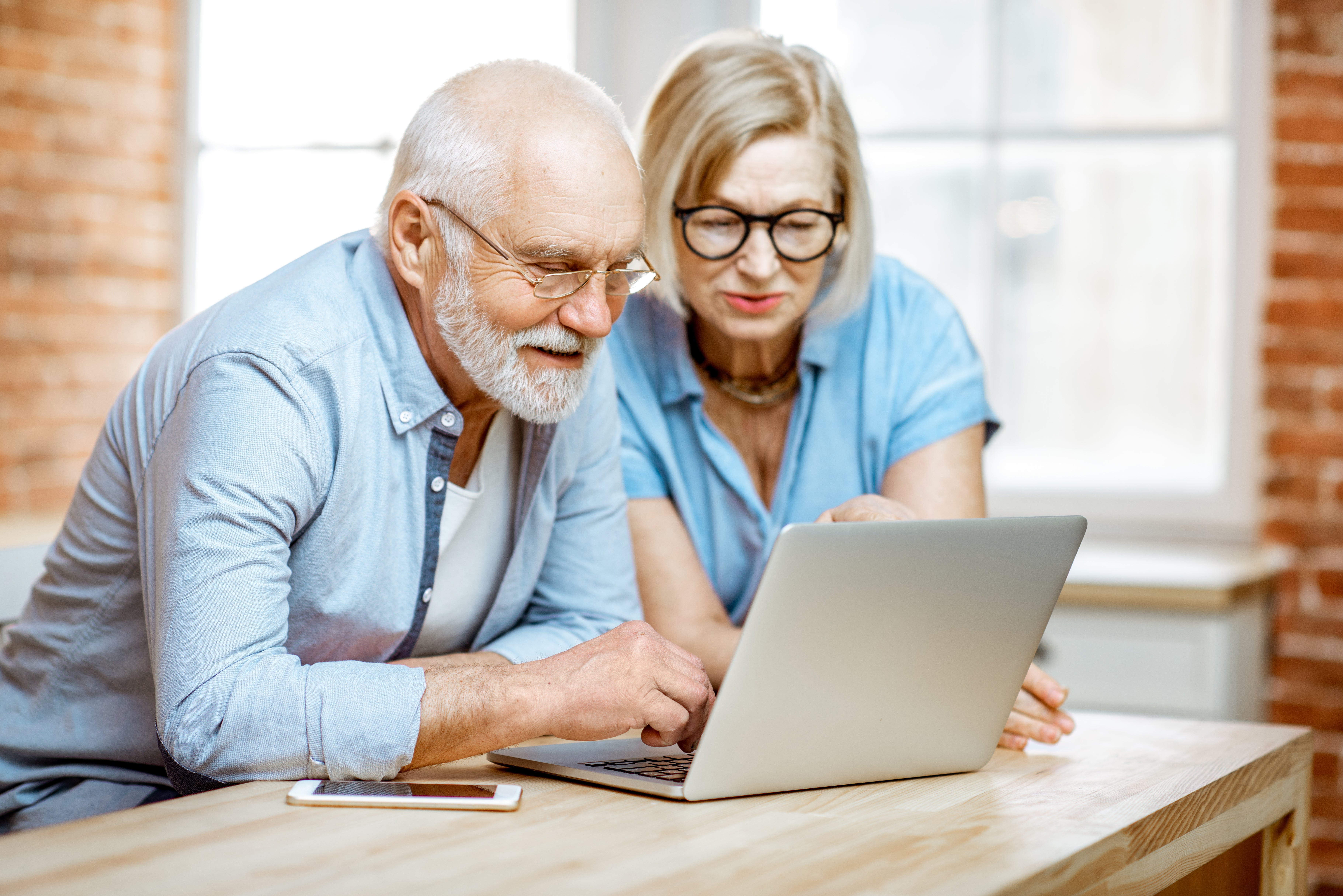 Couple filling out web form