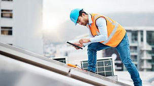 Engineer working on rooftop