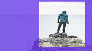 Person standing on the edge of the cliff