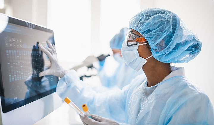 lab worker at computer