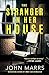 The Stranger in Her House by John Marrs