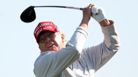 Donald Trump playing golf