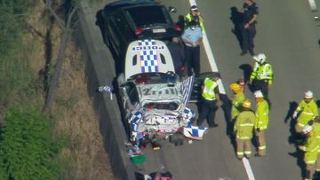 Helensvale gold coast police car crash M1