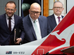 Adam Bandt, Peter Dutton, Anthony Albanese and a Qantas plane.