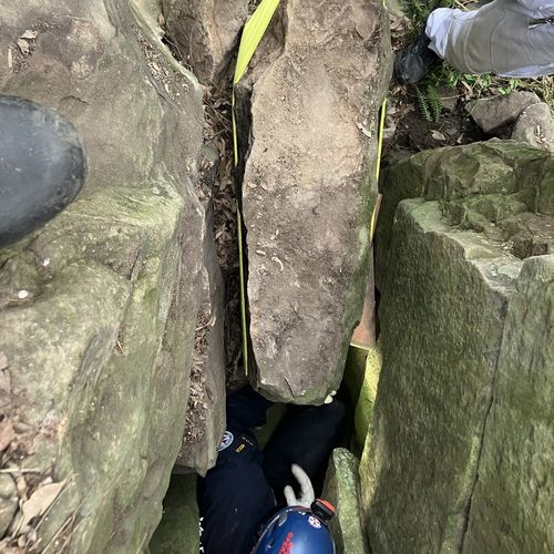 Woman stuck between two boulders in NSW