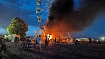 Images showed the Ferris wheel on fire with smoke billowing from the ride.