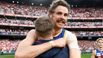 Lincoln McCarthy (left) and Joe Daniher of the Lions celebrate during the 2024 AFL Grand Final match between the Sydney Swans and the Brisbane Lions at The Melbourne Cricket Ground on September 28, 2024 in Melbourne, Australia. (Photo by Michael Willson/AFL Photos via Getty Images)