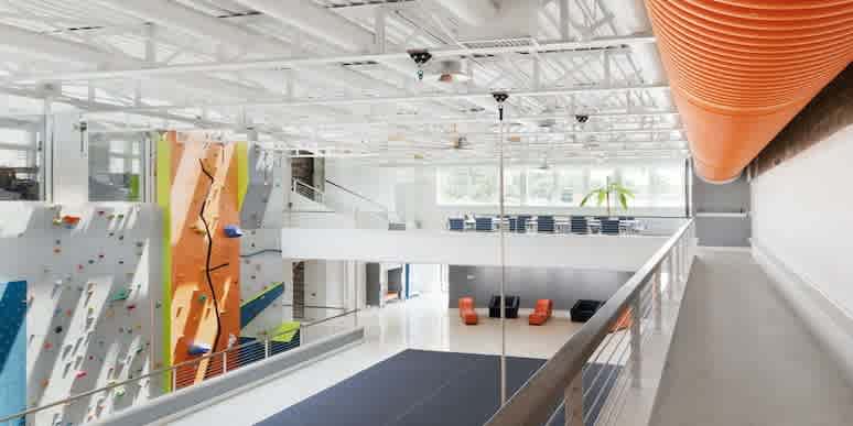 UltraCamp's Michigan headquarters has a rock climbing wall, a foam ball pit, and even a laser tag arena.