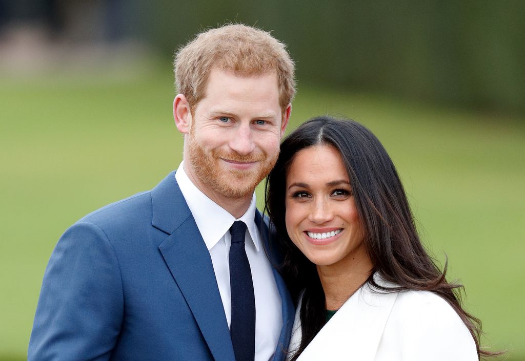 Prince Harry and Meghan Markle attend an official photocall to announce their engagement at The Sunken Gardens, Kensington Palace on November 27, 2017 in London, England. 