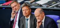 Finanzminister Christian Lindner (FDP), Wirtschaftsminister Robert Habeck (Grüne) und Bundeskanzler Olaf Scholz (SPD) bei einer Sitzung des Bundestags im Sommer 2024