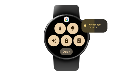 Swiping left or right on a Wear OS smartwatch to access the Google Home Favourites tile and then tapping into the light icon to increase the kitchen light from 50% to 100%.