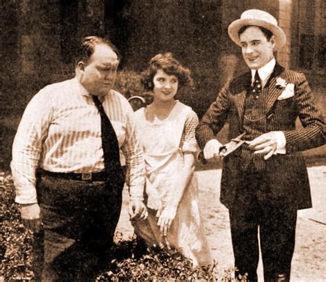 Cullen Landis, Melbourne MacDowell, and Colleen Moore in Forsaking All Others (1922)