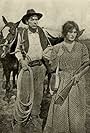 Viola Barry and Jack Conway in The Land of Might (1912)