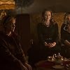 Miranda Otto, Lucy Davis, and Kiernan Shipka in Chilling Adventures of Sabrina (2018)