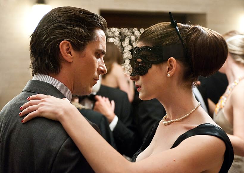 Christian Bale and Anne Hathaway in The Dark Knight Rises (2012)