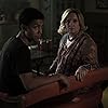 Lucy Davis and Chance Perdomo in Chilling Adventures of Sabrina (2018)