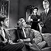 Lauren Bacall, Humphrey Bogart, Sonia Darrin, and Louis Jean Heydt in The Big Sleep (1946)