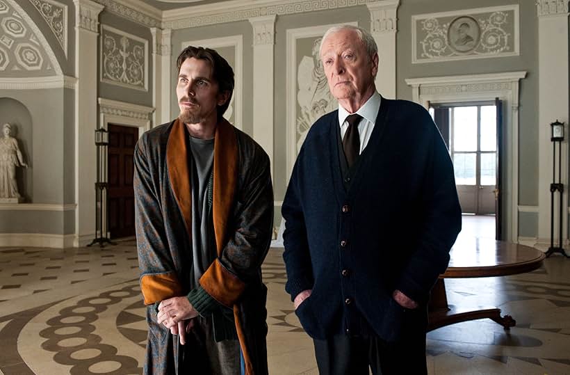 Christian Bale and Michael Caine in The Dark Knight Rises (2012)