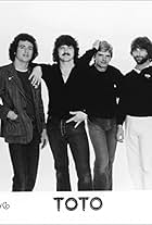 Steve Lukather, David Paich, Jeff Porcaro, Steve Porcaro, David Hungate, Bobby Kimball, and TOTO