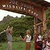 Bill Paxton, Charlize Theron, and Robert Wisdom in Mighty Joe Young (1998)