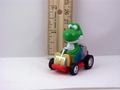 A figurine of Yoshi