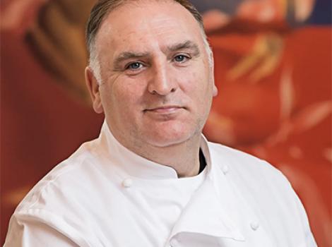 bust length portrait of a man in a chef's white tunic