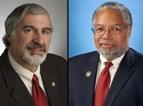 bust-length photos of two men in dark suits with red ties