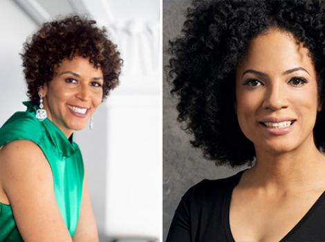 Two young Black women one in a green dress the other in black