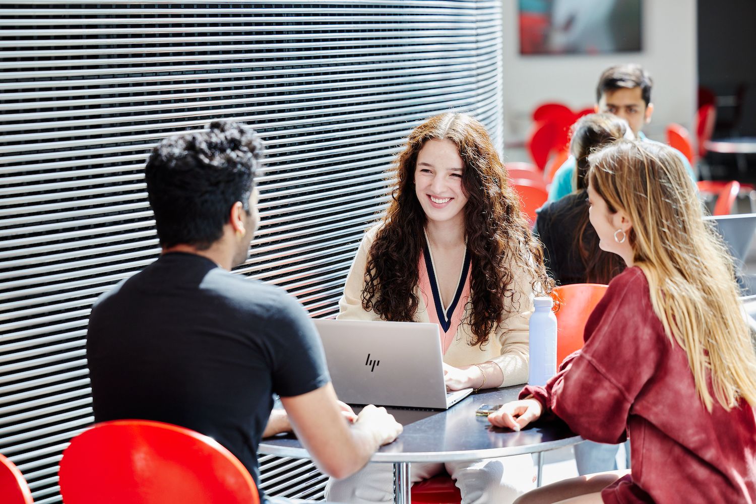 Students gathering in group space