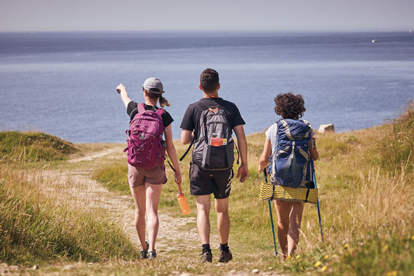 Group of walkers near the sea