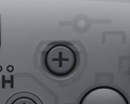 The + button on the Nintendo Switch Pro Controller.