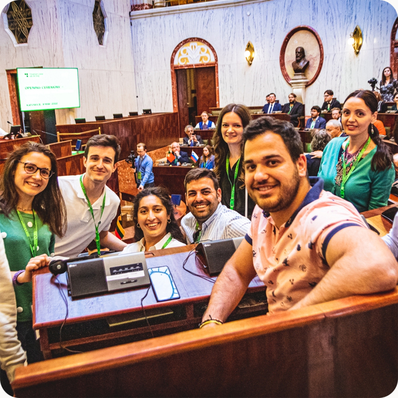 A group of smiling people during the T4EU initiative