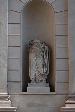 Remnants of a Roman statue on display in the Vatican Museums.