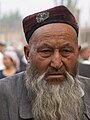 "Uyghur-man-at-Kashgar's-Sunday-market.jpg" by User:Agaceri