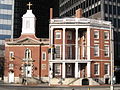 The en:James Watson House, 1793–1806, attributed to en:John McComb Jr. and adjoining shrine to St. en:Elizabeth Ann Seton face Battery Park.