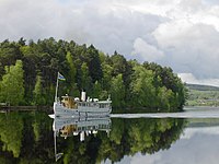 Steam ship S/S Engelbrekt on its way down on the Österdal river to Leksand a calm summer day Author: Mashavet