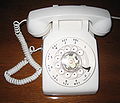 A standard desk phone c. 1950s, with rotary dial, made by Western Electric for Bell Telephone/AT&T. Photo of July 2008.