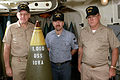 Captain Larry Seaquist (left), Gunner's Mate 1st Class Dale Mortensen (center), and Master Chief Gunner's Mate Charles Hill (right) on Iowa in December 1984