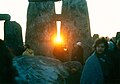 Sunrise between the stones at Stonehenge on the Winter Solstice in the mid 1980s.