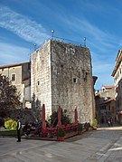 Pentagonal tower (1447) in Gothic style, at the beginning of the Decumanus