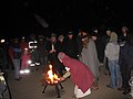 Jólablót (Yule Sacrifice) on Winter Solstice 2009. Contemporary Icelandic pagans, members of Ásatrúarfélagið, stand in a circle around a ceremonial fire as they prepare to conduct a religious ceremony.