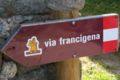 A sign in Italy showing the way of the Via Francigena.