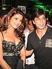 Chopra with co-star Shahrukh Khan at the premiere of their film Don: The Chase Begins Again (2006)