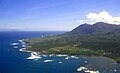 east coast, partially protected by coral reefs with Long Haul Bay visible in the foreground