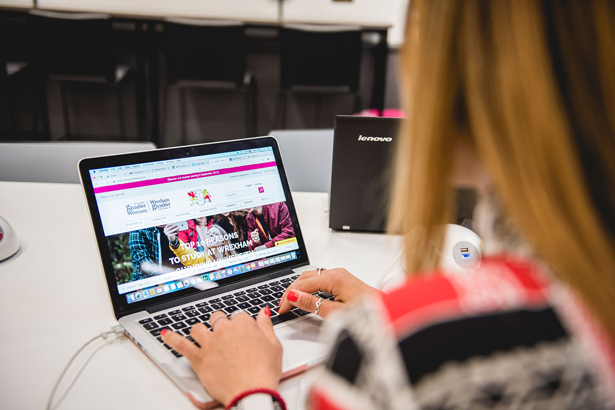 A student using a laptop