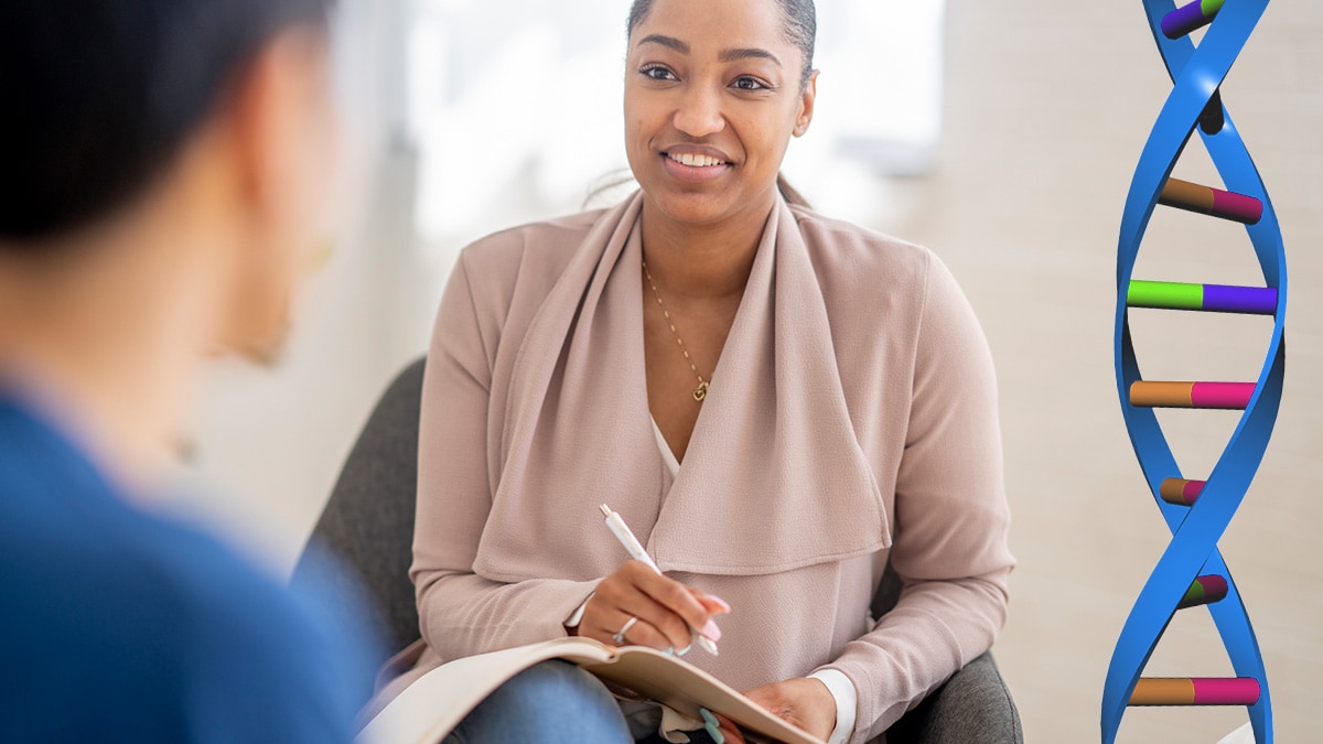 A genetic counselor talking to a patient with a double helix in the background