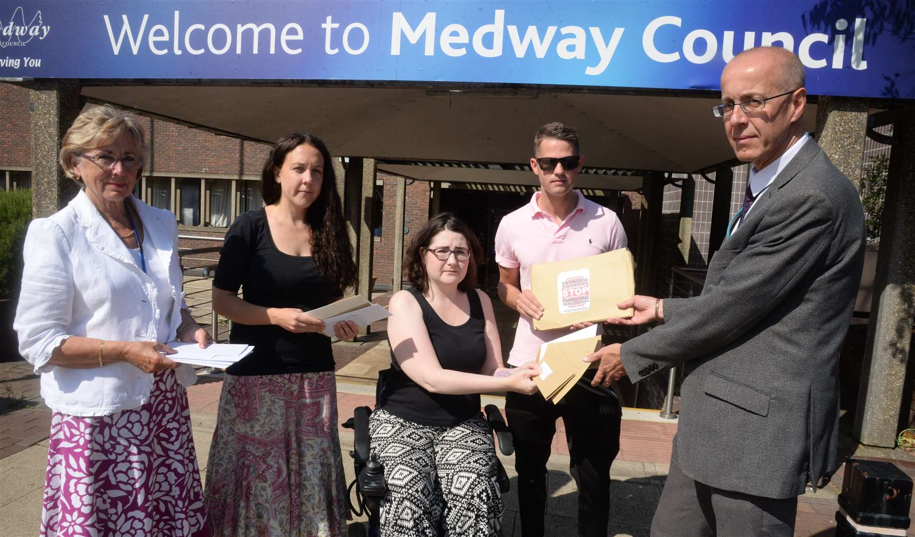 Kate Belmonte (centre) was involved in the campaign against development on Pump Lane. She, along with (left to right) Cllr Kristine Carr, Catriona Jamison, and Cllr Martin Potter presented petitions to Dave Harris, Head of Planning at Medway Council. Picture: Chris Davey.