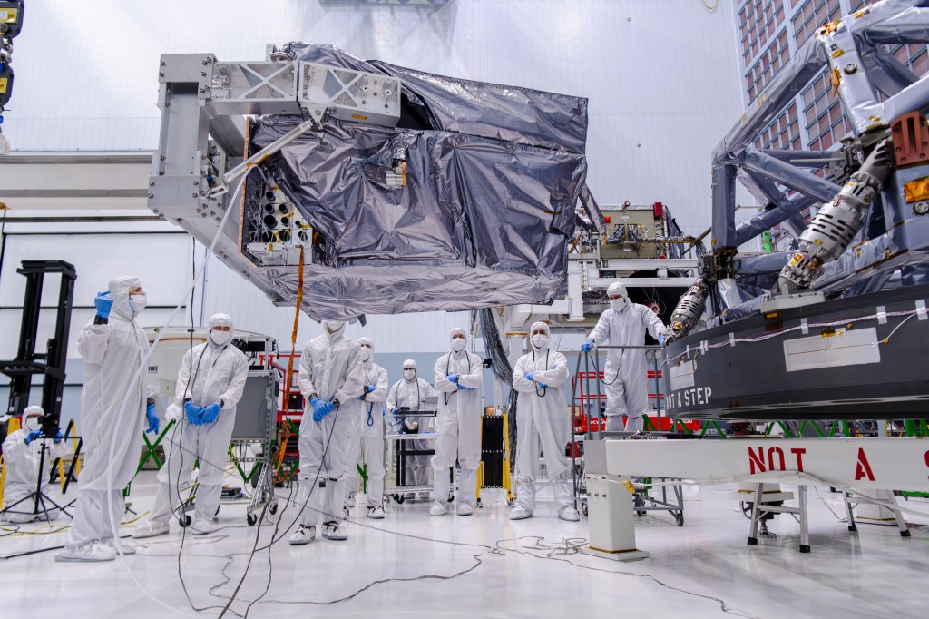 Clean room technicians install the Roman Coronagraph.